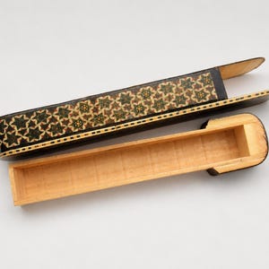 Vintage marquetry wooden pen holder with removable sliding sleeve and empty storage compartment, photographed in a clean white studio to showcase handcrafted Persian artistry.