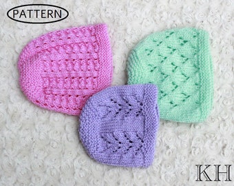 May include: Three knitted hats in pink, light green, and purple. The hats have a lacy pattern and are arranged on a white fluffy surface. The word "PATTERN" is visible in a black oval in the upper left corner of the image. The letters "KH" are visible in the lower right corner of the image.