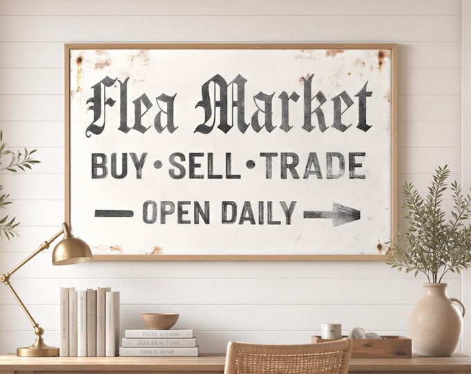 Flea market arrow pointing sign with buy sell trade lettering