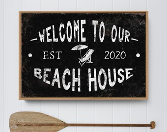 BEACH HOUSE welcome sign > weathered black beachouse canvas with beach chair and umbrella, rusty vintage farmhouse wall art