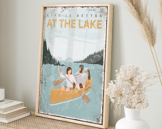 custom lake posters with a couple on a canoe, life is better AT THE LAKE sign, wall art for modern farmhouse lake house decor {vpl}