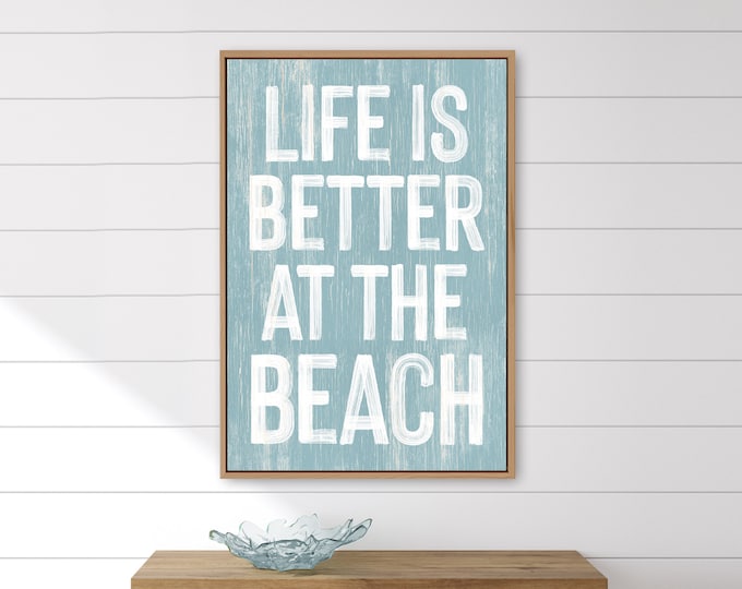 blue BEACH HOUSE decor > light blue "life is better at the BEACH" sign, faux distressed wood wall art print for above couch  {pwo}