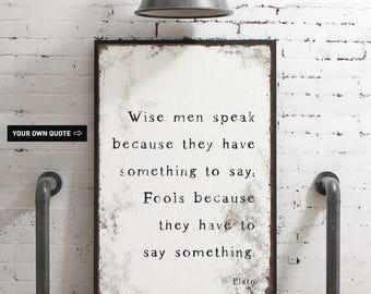 Plato typography print, white quote sign framed in black for a study