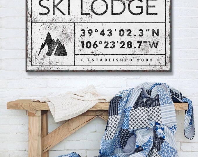 Twin mom gift idea, ski lodge sign with coordinates and family name beneath a twin peak