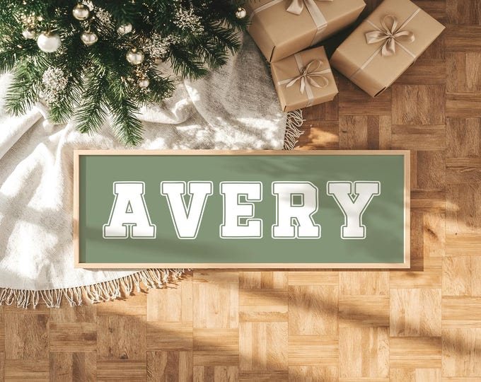 White lettering on seagrass green, custom name sign in varsity type