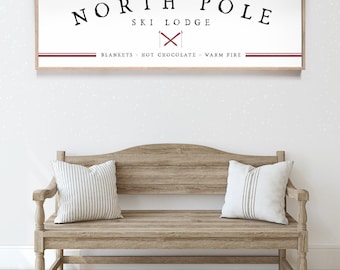 Christmas Wall Art, North Pole Ski Lodge Sign with Crossed Red Skis, Blankets and Hot Chocolate