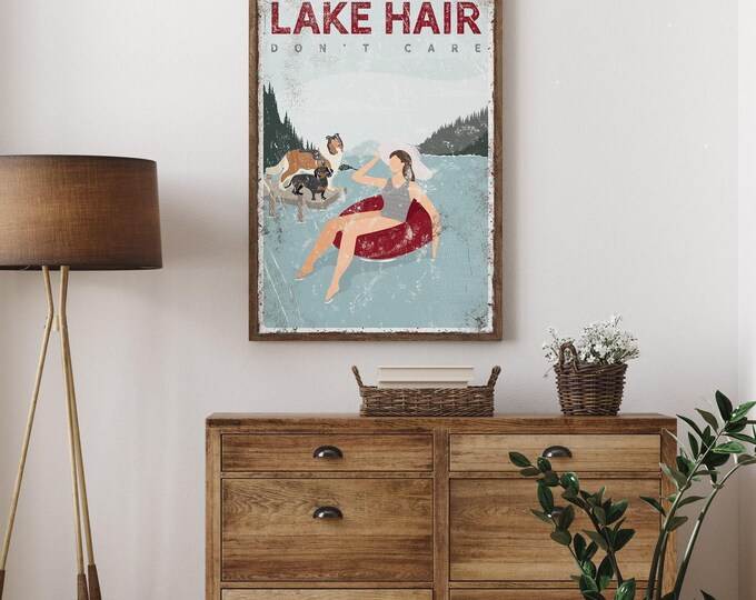Tube Lake Sign, Maroon Float Woman And Dogs On The Dock, Lake Hair Carefree Quote