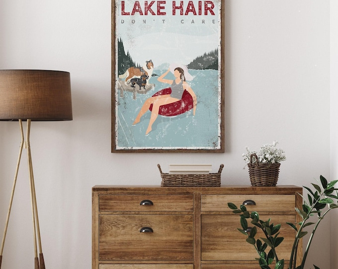 Tube Lake Sign, Maroon Float Woman And Dogs On The Dock, Lake Hair Carefree Quote