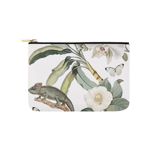 May include: A white zippered pouch with a floral and animal print. The print features a chameleon, butterflies, orchids, and camellias.