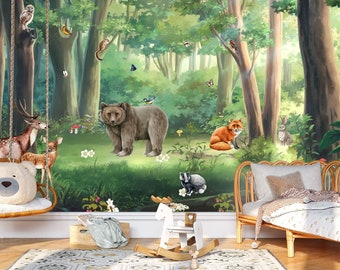 May include: A wall mural featuring a lush green forest scene with a brown bear, a red fox, a deer, a fawn, a rabbit, a badger, and various birds. The illustration includes tall trees, foliage, and small white flowers set against a woodland backdrop.
