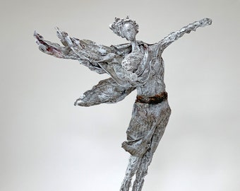 Gray sculpture made of paper mache with a waving scarf, human, art, unique, original, mixed media