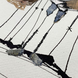 May include: Abstract mixed media artwork featuring a figure with blue and brown tones, suspended by black lines. The artwork has a textured appearance with visible brushstrokes and paper elements, set against a white background.