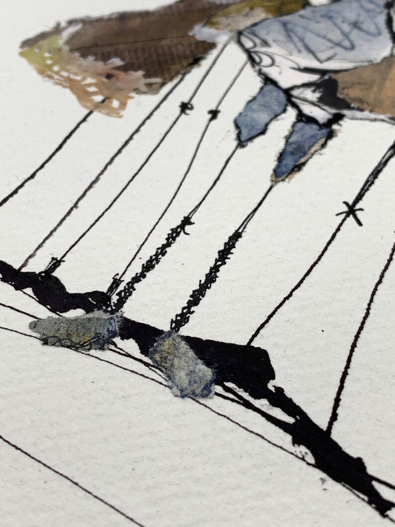 May include: Abstract mixed media artwork featuring a figure with blue and brown tones, suspended by black lines. The artwork has a textured appearance with visible brushstrokes and paper elements, set against a white background.