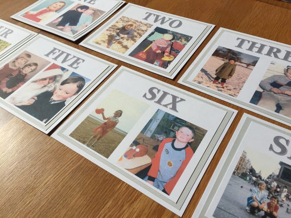 At This Wedding Each Table Number Had Photos Of The Bride And Groom At That Age Wedding Numbers Photo Table Numbers Wedding Table