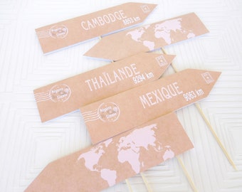 Travel theme wedding table name. Table name sign Customizable with your first and last names of countries - Kraft and pink travel name holder