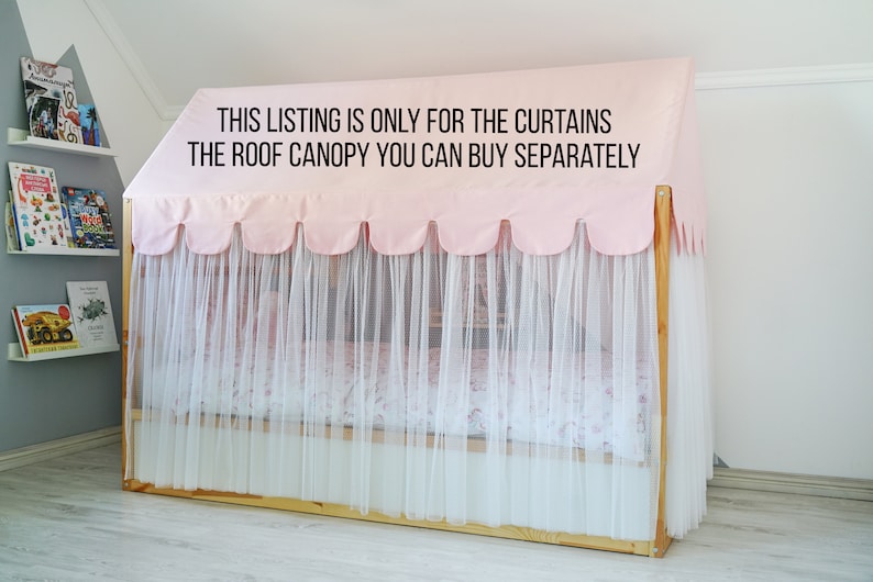 May include: Pink and white curtains with scalloped edges hang from a wooden frame. The text "THIS LISTING IS ONLY FOR THE CURTAINS THE ROOF CANOPY YOU CAN BUY SEPARATELY" is printed on the pink fabric.