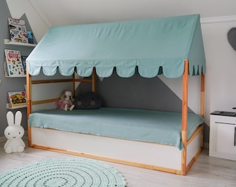 May include: A light blue canopy bed frame with a white mattress and a light blue blanket. The bed is in a child's room with a gray wall and a white rug.