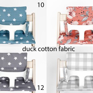 May include: Four different chair cushions for a high chair. The cushions are in various patterns, including stars, flowers, and plaid. The cushions are made of duck cotton fabric. The numbers 10, 11, 12, and 13 are visible in the image.