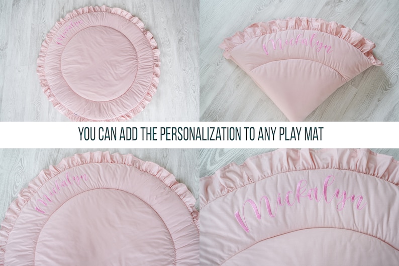 May include: A pink round play mat with a ruffled edge and the name "Mikayla" embroidered in pink on the surface. You can add the personalization to any play mat.