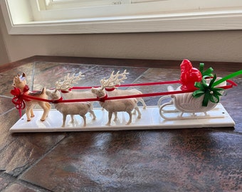 Santa Claus and his Reindeer Mantel Decoration