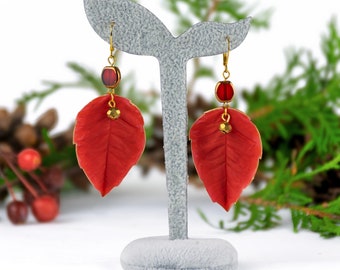 Red poinsettia earrings - Realistic polymer clay leaves with golden and red beads, Botanical handmade winter jewelry, Festive gift for her