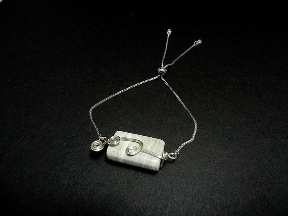 Silver Bolo Bracelet with Silver Wire Wrapped Light Gray Feldspar Jasper