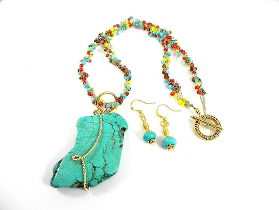 Large Turquoise Gemstone Gold Wire Wrapped on a Gold Crocheted Wire Necklace with Matching Turquoise Earrings