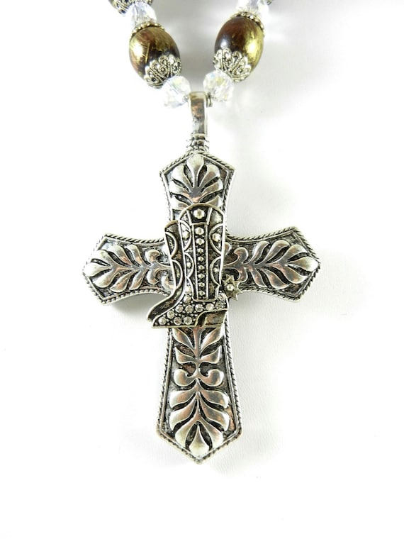 Silver Cross Necklace with A Gold and Crystal Cowboy Boot with Matching Earrings