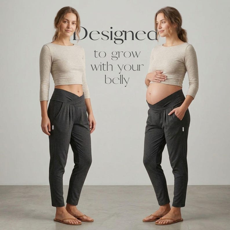 May include: Two images side-by-side show a person wearing a beige long-sleeve crop top and dark gray maternity pants. The text "Designed to grow with your belly" is displayed. The pants have a crossover waistband and pockets. The person is wearing sandals.