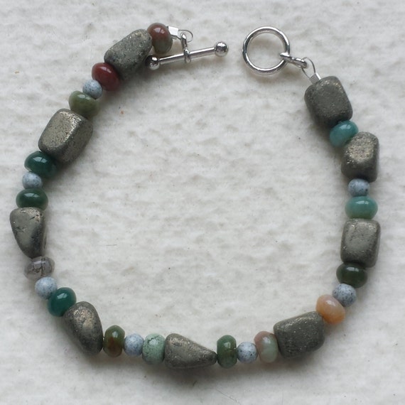 Items similar to Ceramic Bead Bracelet on Etsy