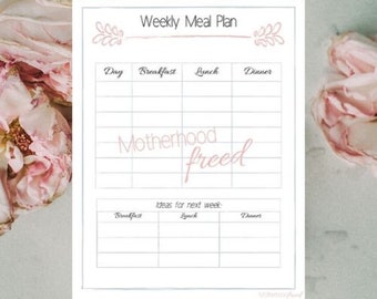 May include: A white weekly meal plan with a pink floral design. The text "Weekly Meal Plan" is at the top, with sections for each day, breakfast, lunch, and dinner. The words "Motherhood freed" are written in pink cursive.