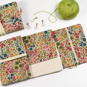 May include: A trio of ceramic mugs with a speckled, matte finish in grey, white, and black. The mugs have a simple, modern design, ideal for tea or coffee.