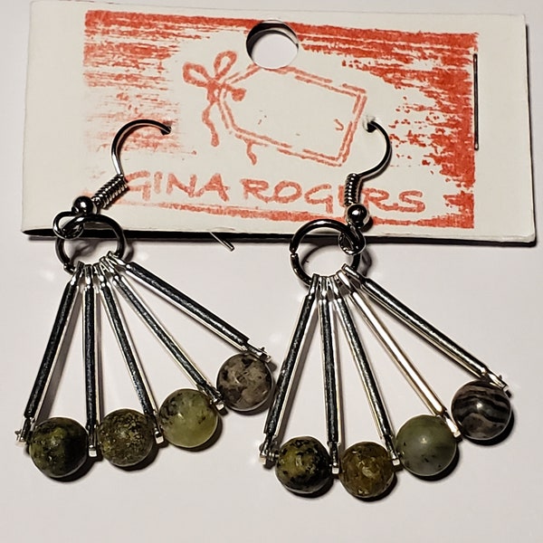 Authentic stone chandelier earrings.  Color variation of green to grey. Very stylish.Stones connected together between bars.