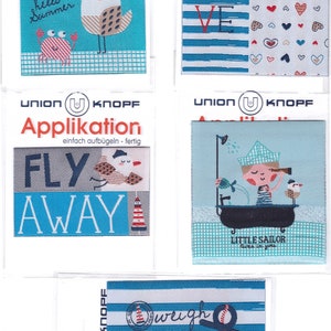 May include: Five iron-on patches with a nautical theme. The patches feature a seagull, a heart pattern, a lighthouse, a boy in a bathtub, and an anchor. The patches are all blue and white with red accents.