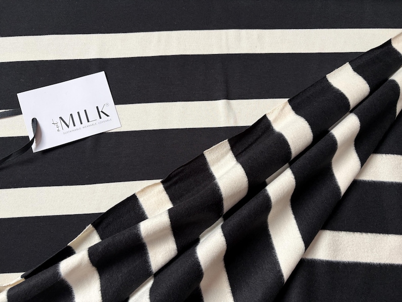 SAVA Sweat by MeetMILK block stripes black shell image 1