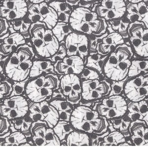 Katoenen stof met doodskopmotief, volledig grijs.