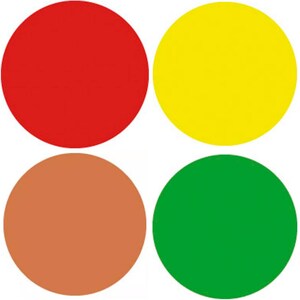 May include: Four circles in different colours: red, yellow, brown, and green. The circles are arranged in a square pattern.
