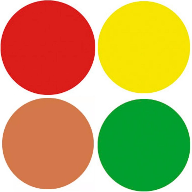 May include: Four circles in different colours: red, yellow, brown, and green. The circles are arranged in a square pattern.