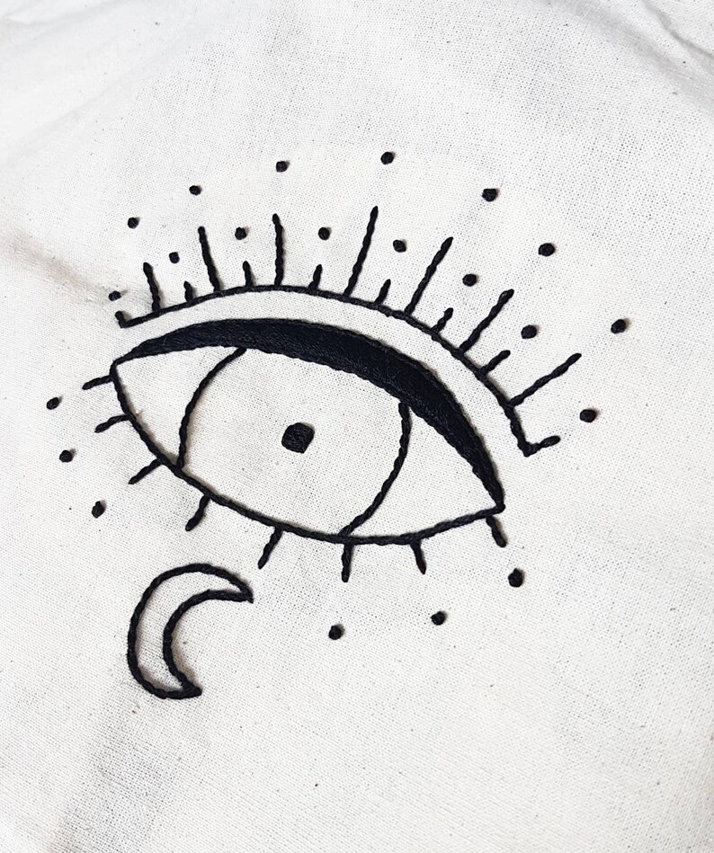 embroidery black eye and moon Tote bag in beige cotton