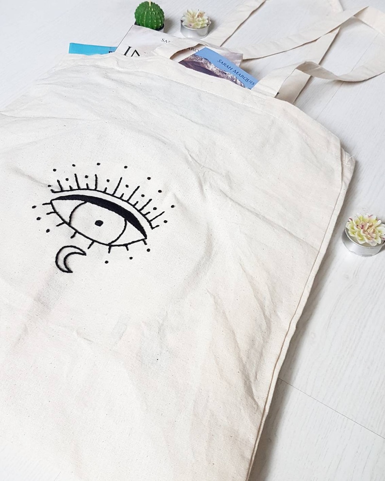 embroidery black eye and moon Tote bag in beige cotton