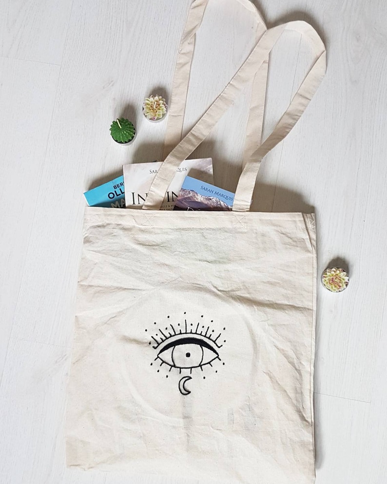 embroidery black eye and moon Tote bag in beige cotton