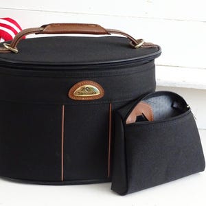 Vintage zwarte Samsonite-treinkoffer: make-uporganizer voor op reis