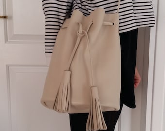 Nude bucket bag with tassels, beize leather bucket bag, cowhide leather bucket