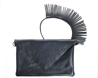 leather envelope in metallic blue with fringes on the strap, shoulder bag, leather clutch fringes on the strap