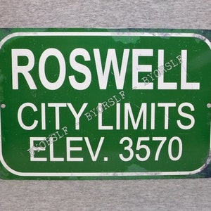 Metal Sign ROSWELL New Mexico city limits UFO flying saucer crash incident disc conspiracy theory extraterrestrial military area 8&quot; x 12&quot;
