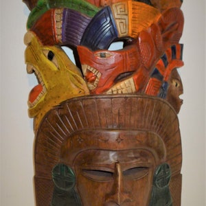 Beautiful hand carved wood Mayan plaque, tribal symbols from Mexico