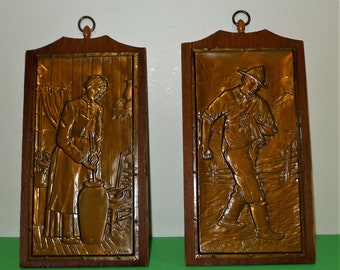 Pair of wall hanging embossed copper carvings by A Nadeau,Quebec