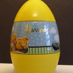 Rare HARROD'S Easter empty egg shaped tin - In excellent condition.