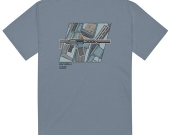 May include: A blue t-shirt with a graphic of a rifle and the text "Alpaca Arms" printed on the back.
