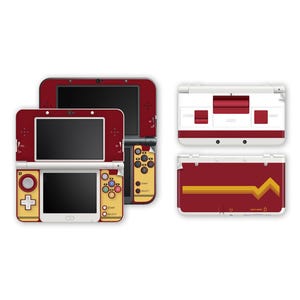 May include: Several Nintendo 3DS consoles and accessories are shown. The consoles have a red and gold colour scheme. The accessories include a top and bottom cover with a red and gold design, and a gold-coloured control panel.
